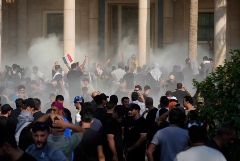 Iraqi security forces assault, detain journalists covering Baghdad protests